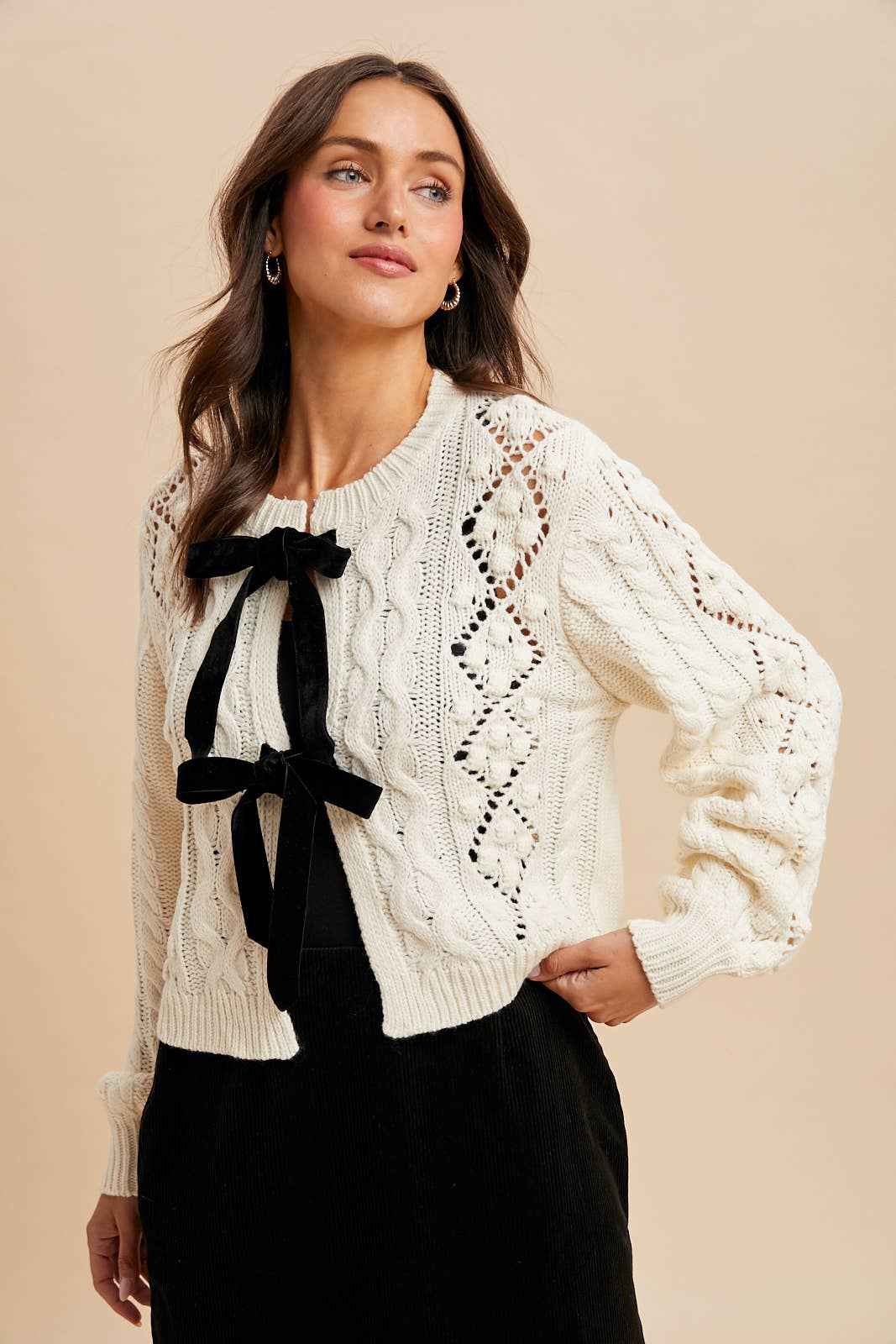 CABLE KNIT CARDIGAN WITH RIBBON TIE