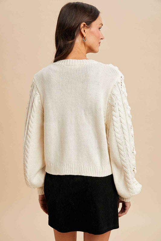 CABLE KNIT CARDIGAN WITH RIBBON TIE